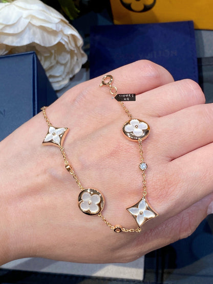 [Violet JW]STAR AND SUN 4 MOTIF WHITE MOP PINK GOLD BRACELET
